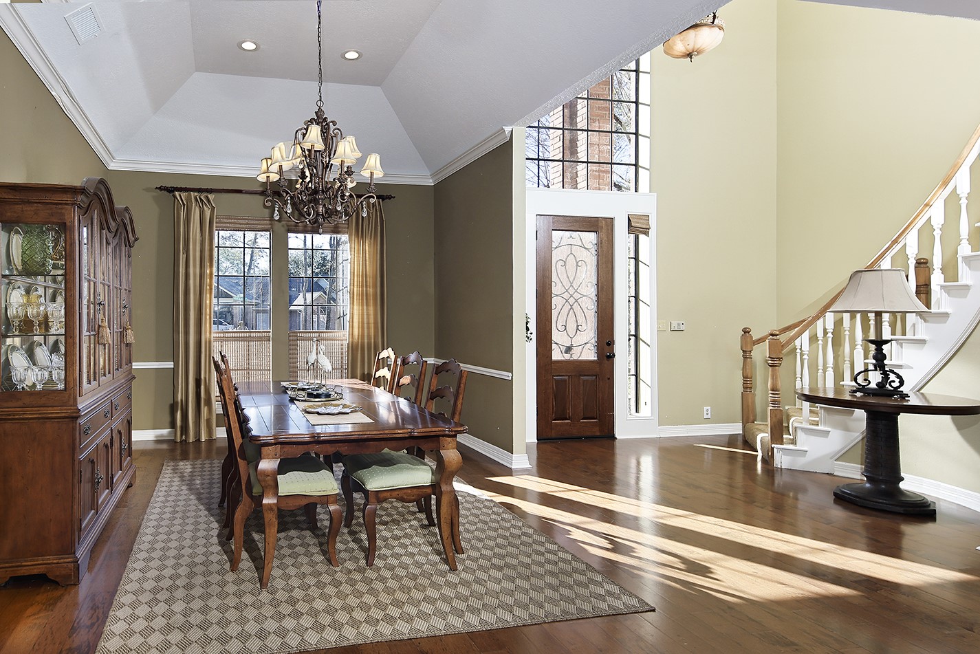 24635 West Kingscrest Circle Spring, TX 77389 - Photo 7 of 38 a view of a a dining room with furniture window and wooden floor