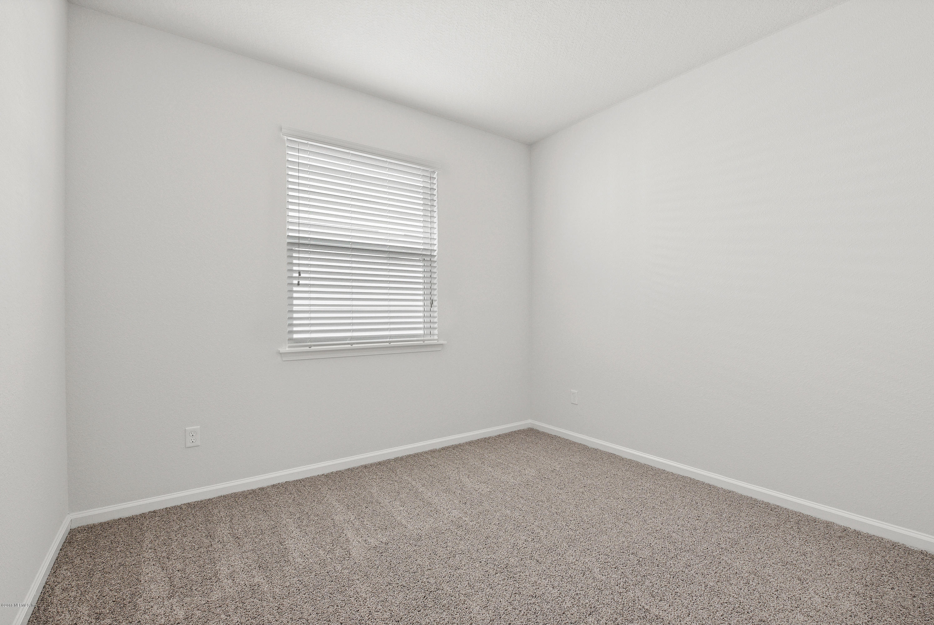 6625 Azalea Park Road Jacksonville, FL 32259 - Photo 20 of 26 an empty room with a window