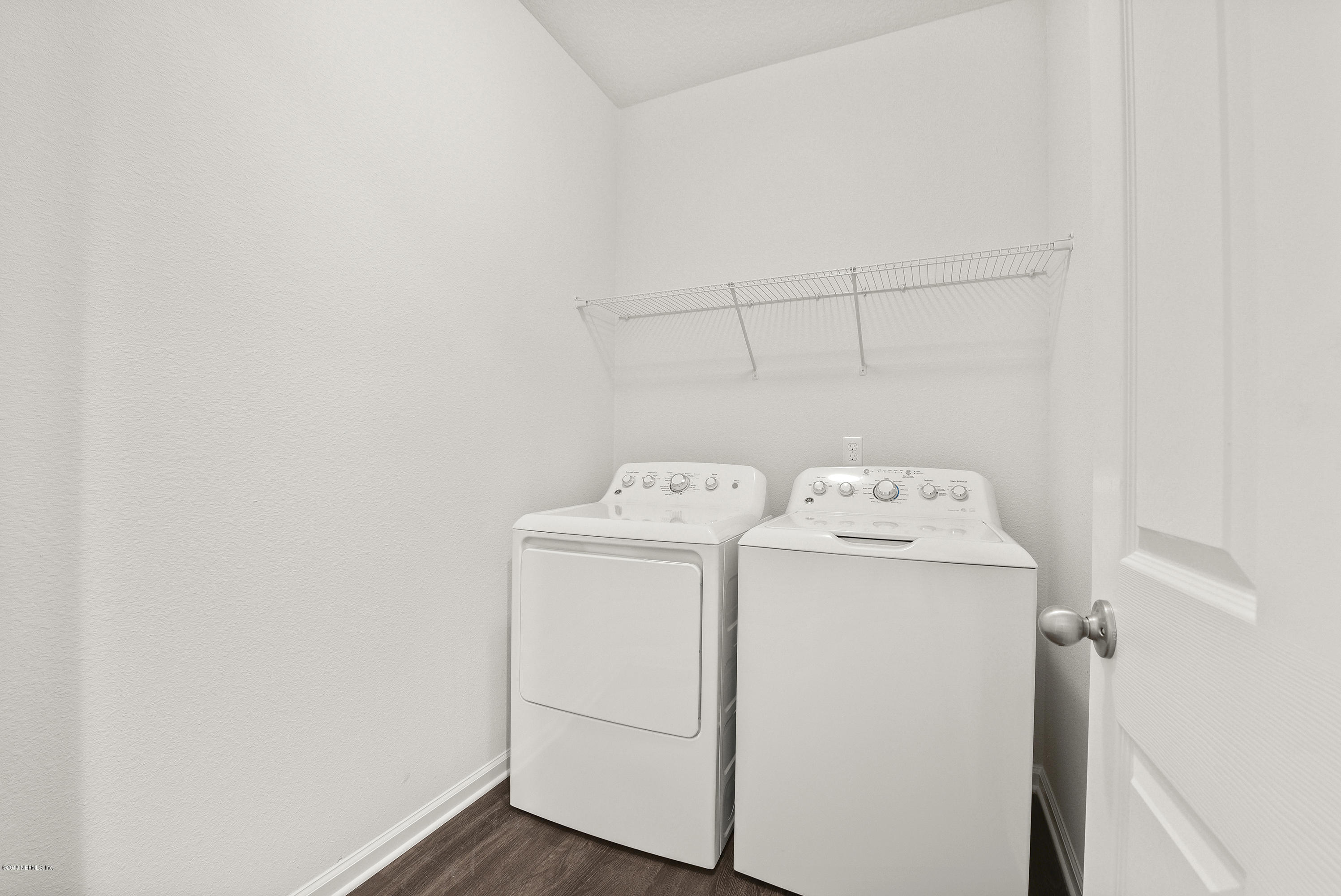 6625 Azalea Park Road Jacksonville, FL 32259 - Photo 21 of 26 a utility room with dryer and washer