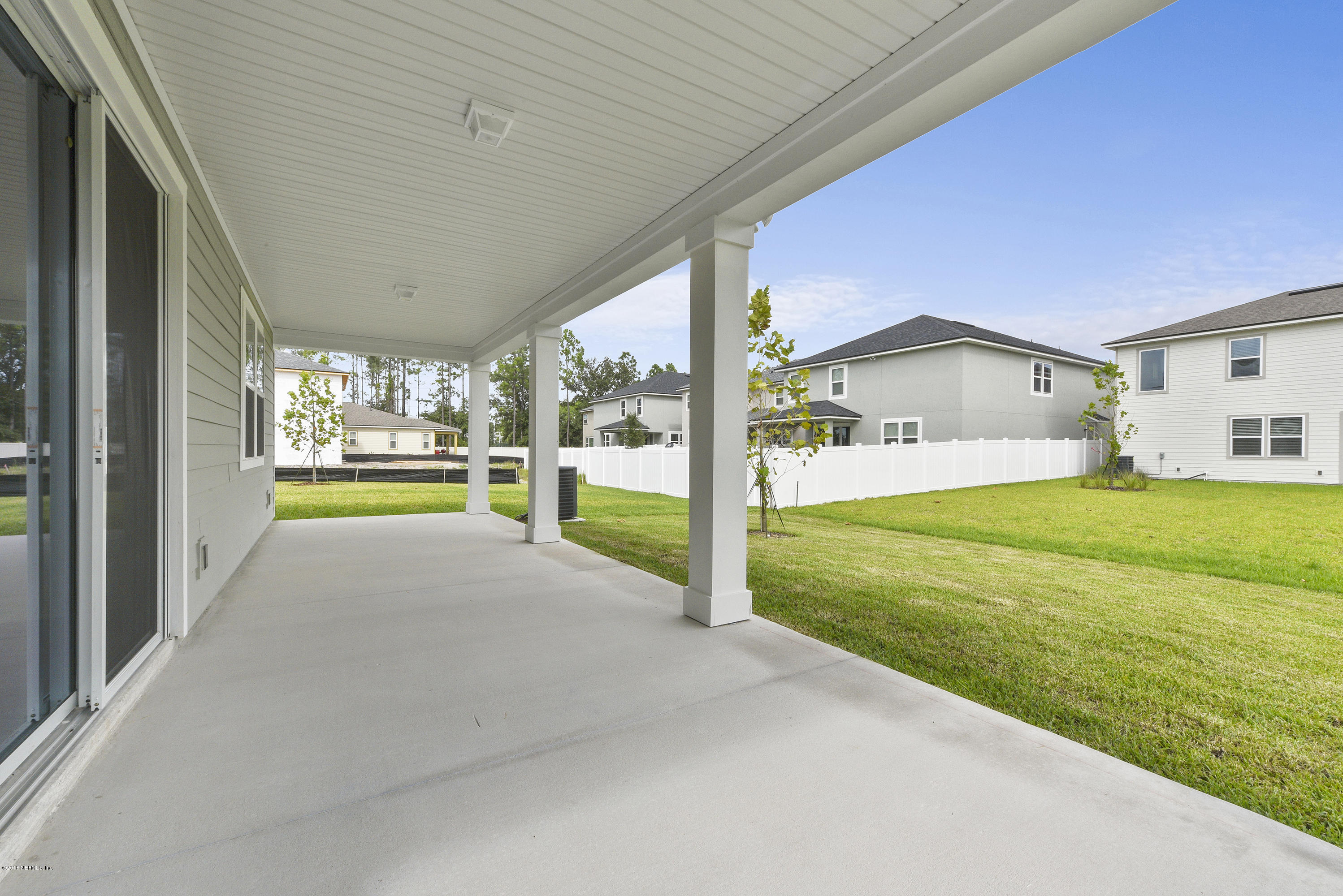 6625 Azalea Park Road Jacksonville, FL 32259 - Photo 22 of 26 a view of a house with backyard and porch