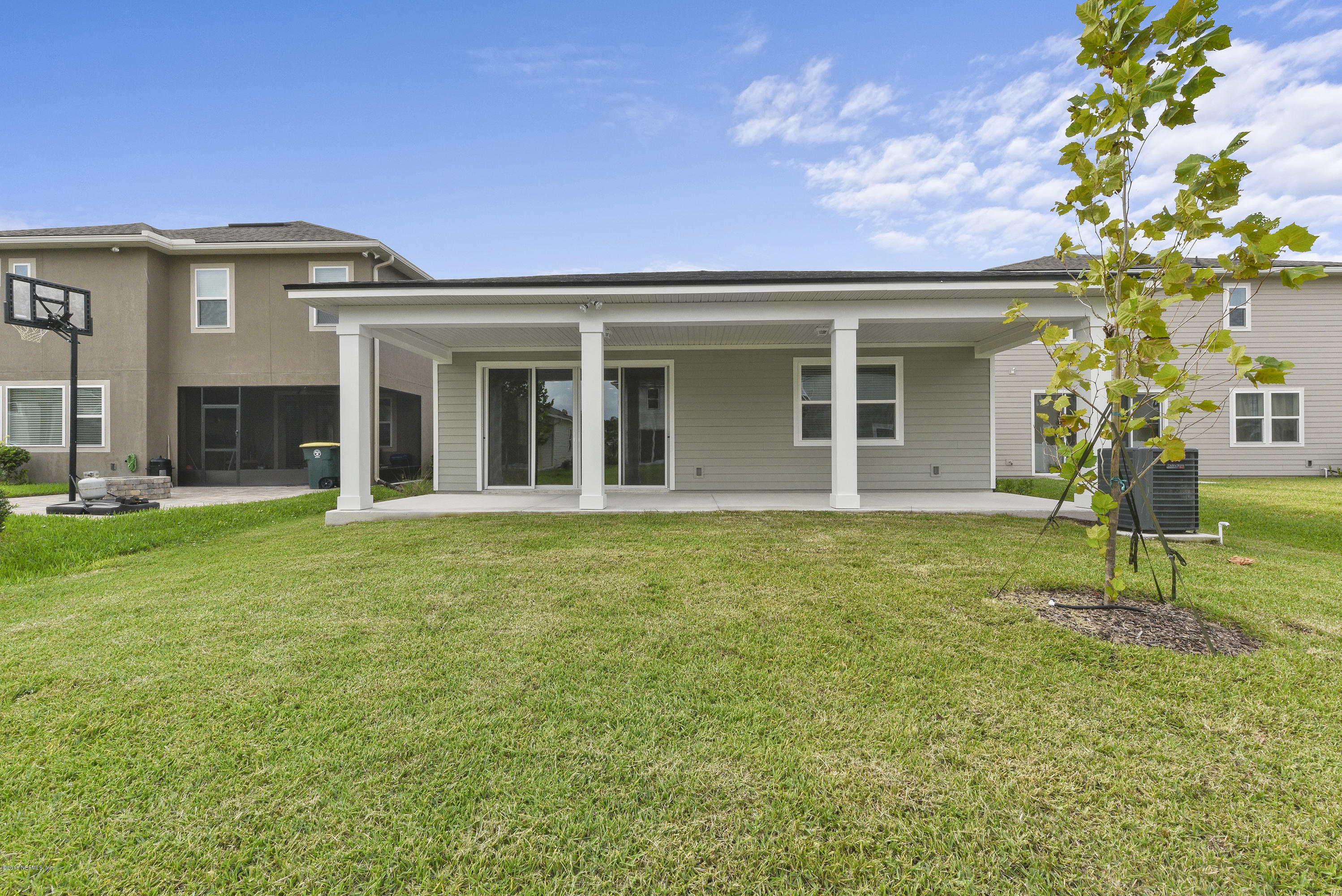 6625 Azalea Park Road Jacksonville, FL 32259 - Photo 23 of 26 a view of a house with a backyard