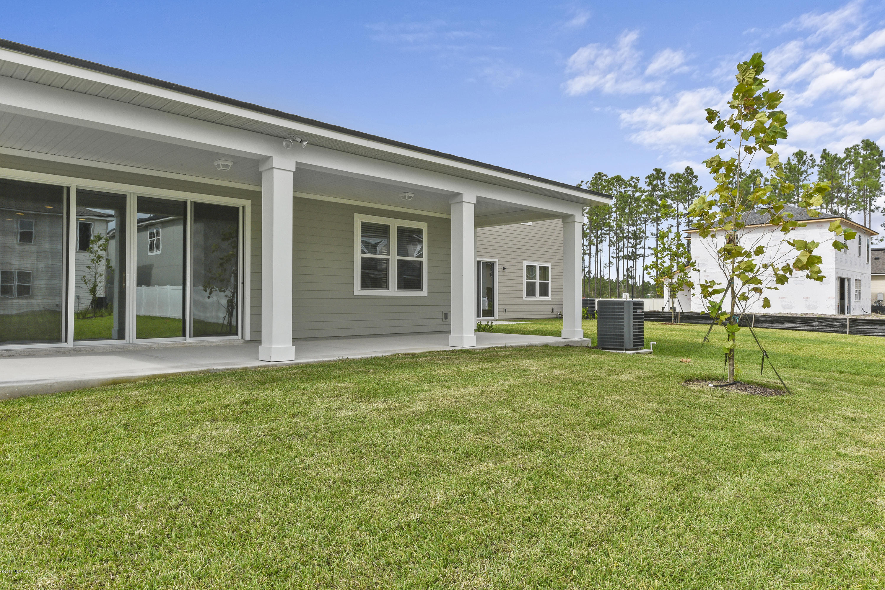 6625 Azalea Park Road Jacksonville, FL 32259 - Photo 24 of 26 front view of a house with a yard
