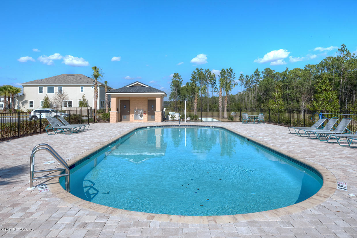 6625 Azalea Park Road Jacksonville, FL 32259 - Photo 26 of 26 a view of a swimming pool with a patio