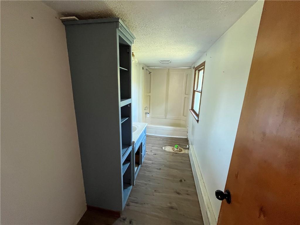 1008 38th Street Northern Cambria, PA 15714 - Photo 9 of 10 a view of a hallway with wooden floor and staircase