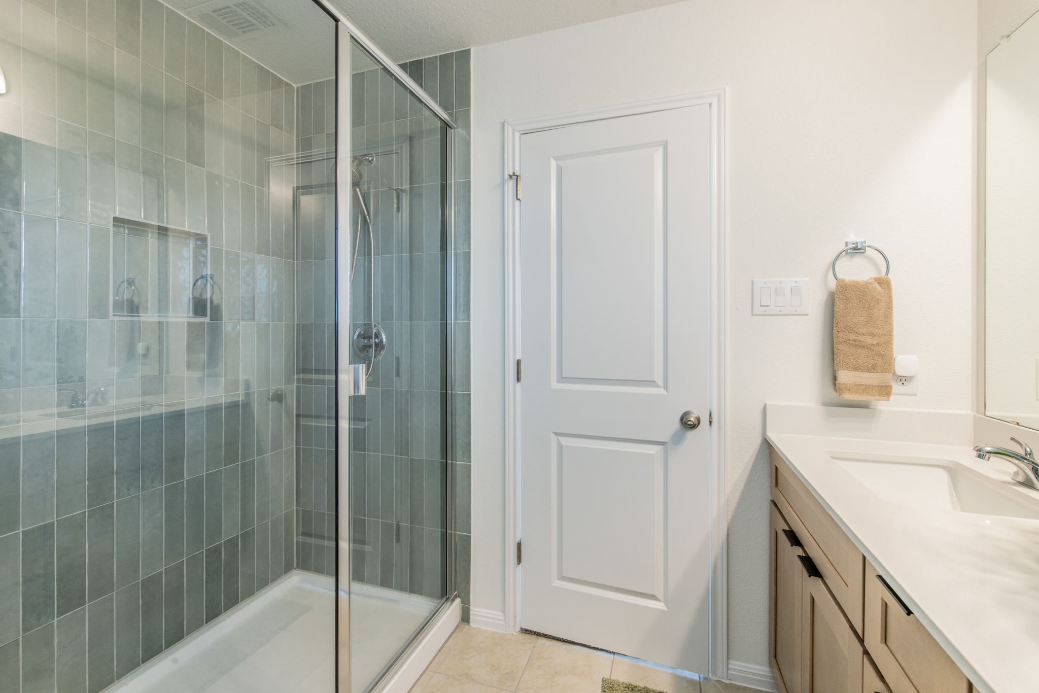 593 Backstays Loop Kyle, TX 78640 - Photo 11 of 26 a bathroom with a shower and a sink
