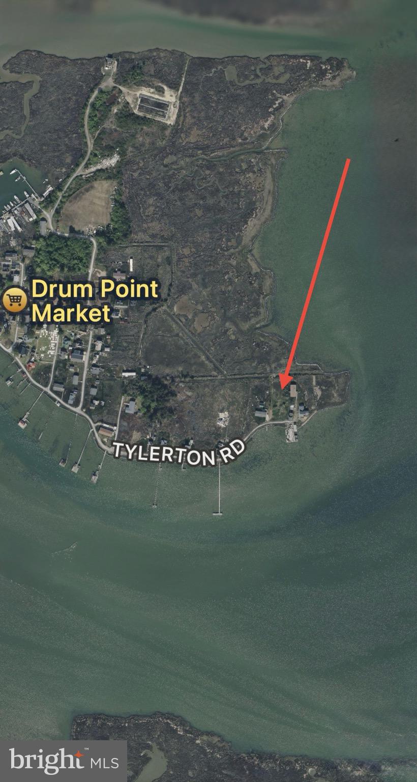 9-14 Tylerton Road Tylerton, MD 21866 - Photo 4 of 4 a view of water heater and basketball court