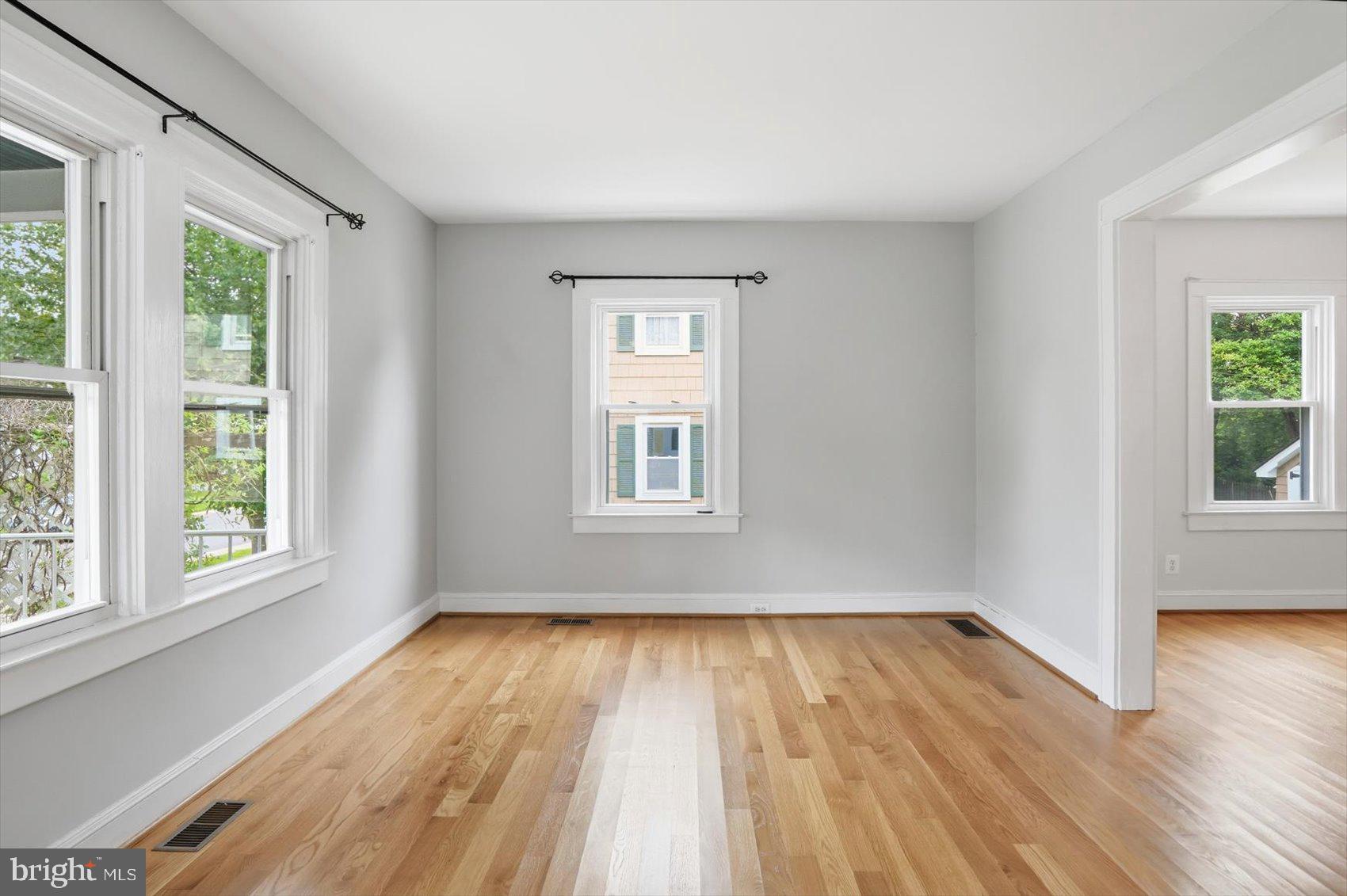 24 Normal Terrace Baltimore, MD 21286 - Photo 6 of 37 a view of empty room with wooden floor and fan