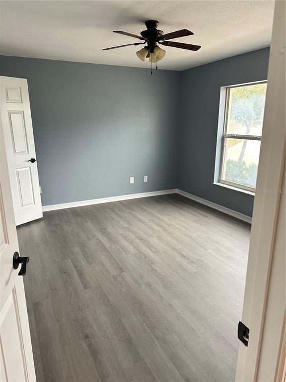 5140 Southwest 159th Street Ocala, FL 34473 - Photo 11 of 13 an empty room with windows