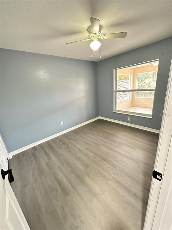 5140 Southwest 159th Street Ocala, FL 34473 - Photo 8 of 13 an empty room with a window