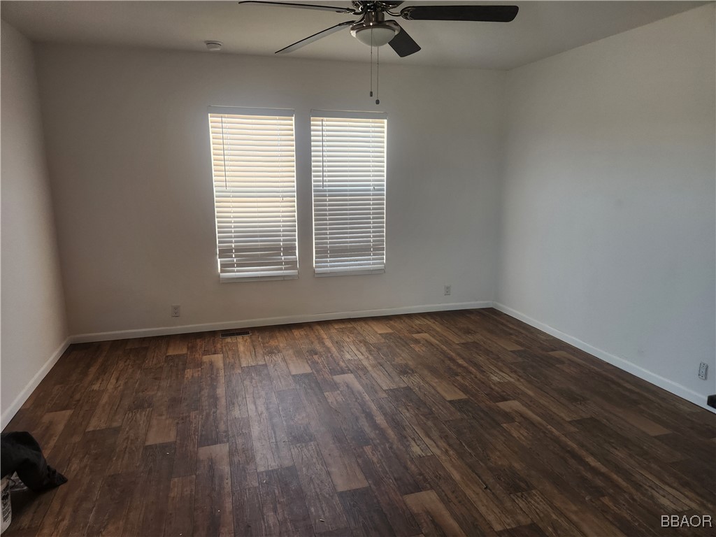 60784 Stagemans Road Landers, CA 92285 - Photo 2 of 9 an empty room with a window