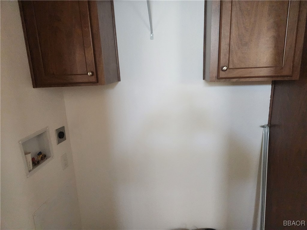 60784 Stagemans Road Landers, CA 92285 - Photo 6 of 9 a bathroom with a sink and a microwave
