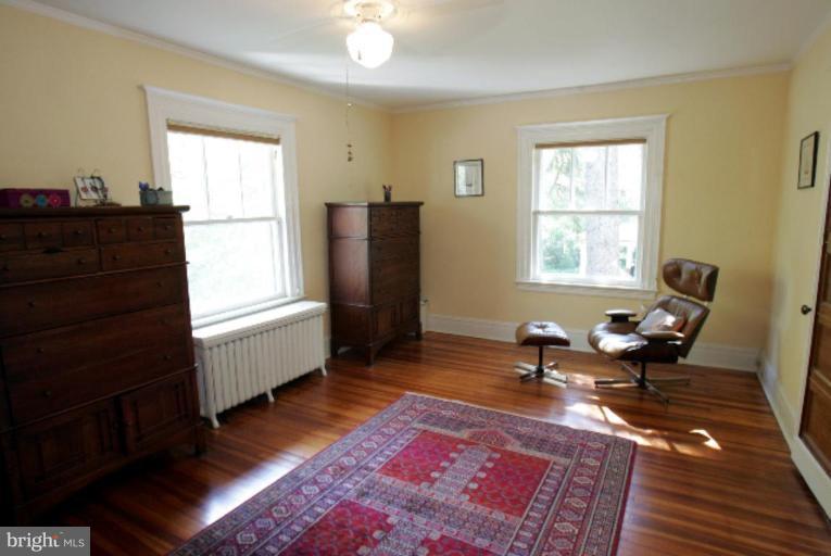 4 Longwood Road Baltimore, MD 21210 - Photo 15 of 23 a living room with furniture and a window