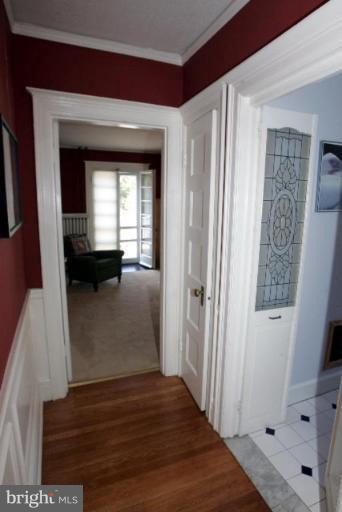 4 Longwood Road Baltimore, MD 21210 - Photo 17 of 23 a view of entryway with wooden floor