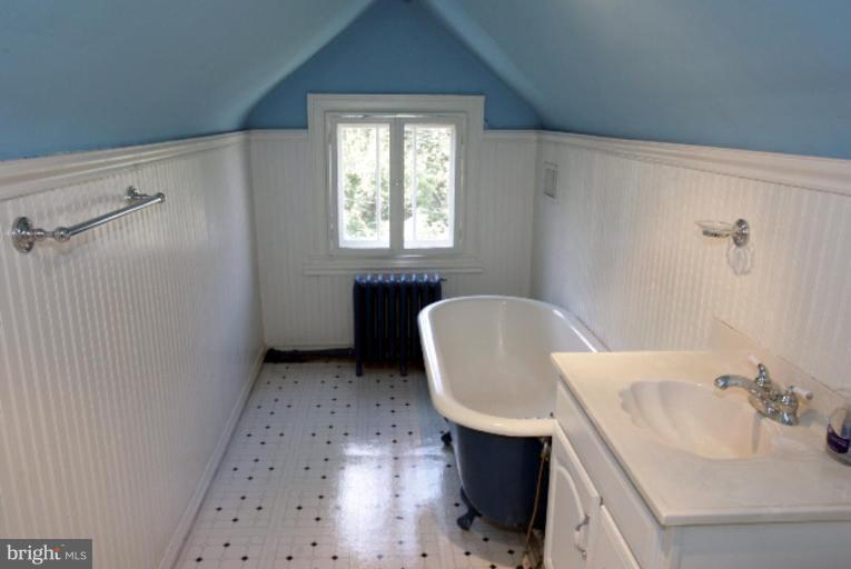 4 Longwood Road Baltimore, MD 21210 - Photo 21 of 23 a bathroom with a sink and a toilet