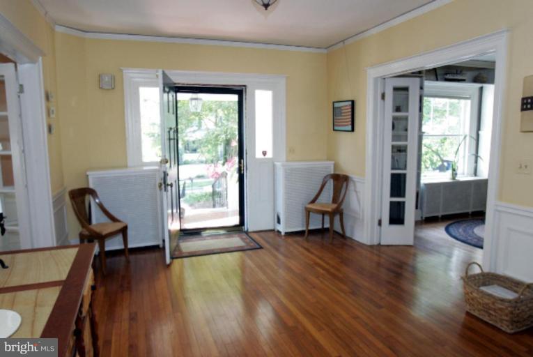 4 Longwood Road Baltimore, MD 21210 - Photo 4 of 23 a living room with furniture and a window