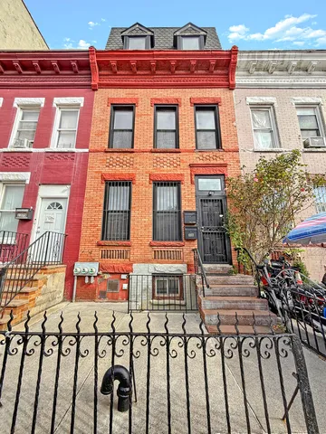 a building view with a brick wall