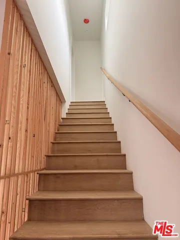 a bathroom with a double vanity sink mirror and