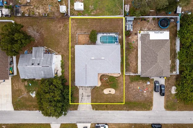 an aerial view of a city with lots of residential buildings