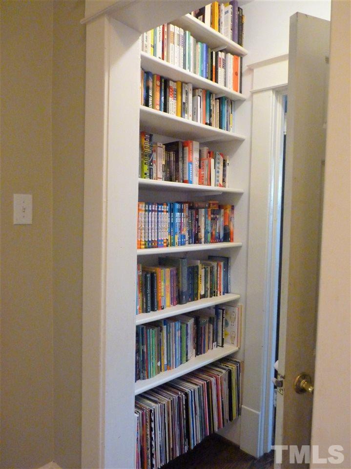 807 West South Street Raleigh, NC 27603 - Photo 13 of 30 Bookcases in the hall to the office