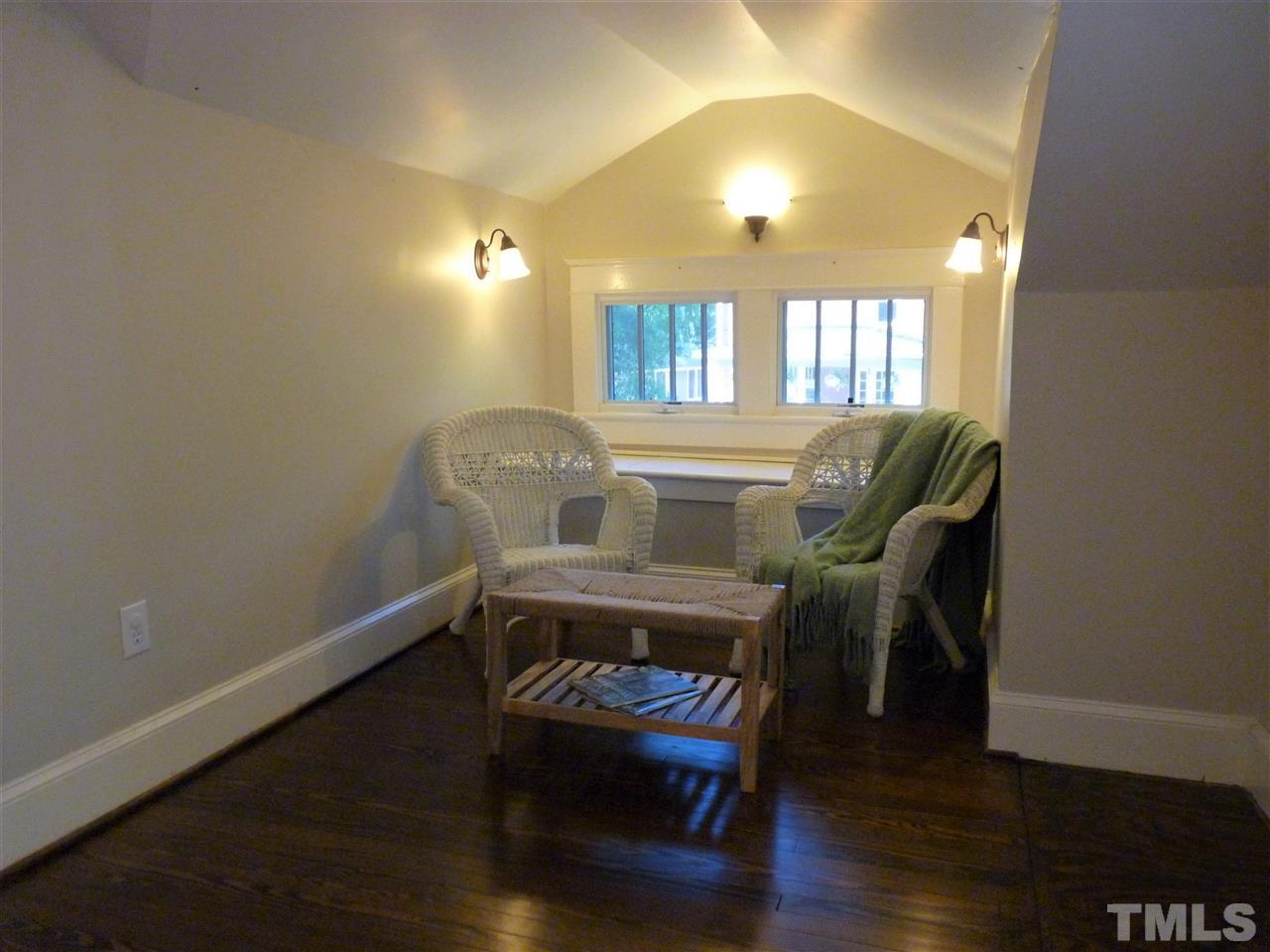 807 West South Street Raleigh, NC 27603 - Photo 17 of 30 The nice upstairs seating area with a built-in cedar storage bench