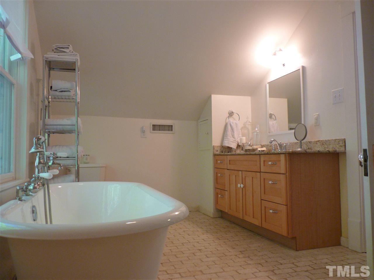 807 West South Street Raleigh, NC 27603 - Photo 19 of 30 Claw foot tub, separate shower in the large master bath.