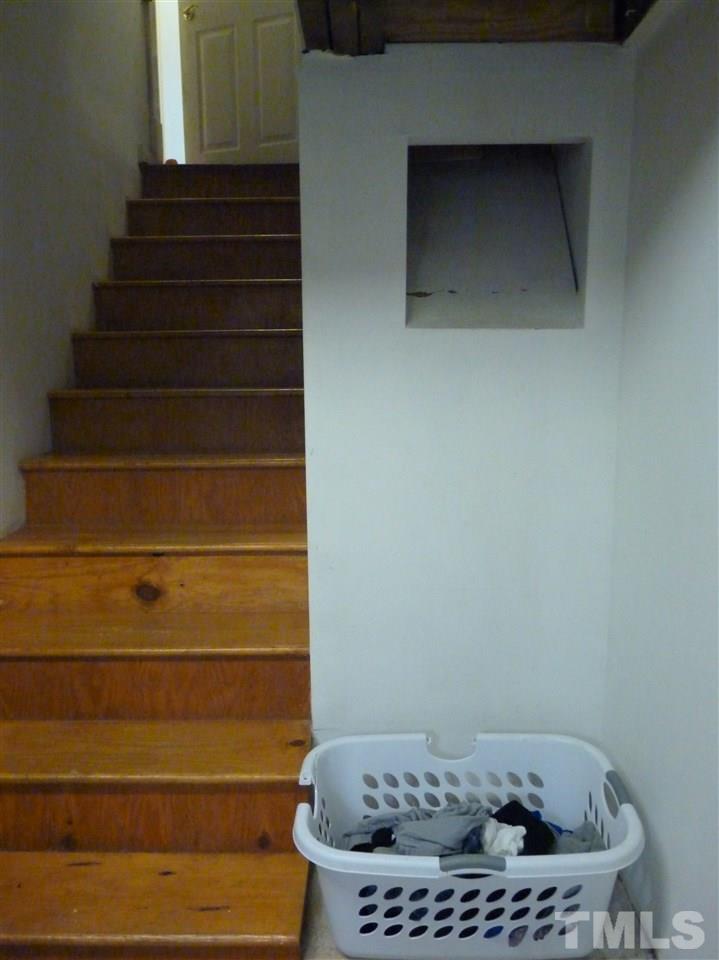 807 West South Street Raleigh, NC 27603 - Photo 21 of 30 Laundry Chute!! Connects from both bathrooms to right by the laundry in the basement - how cool is that!