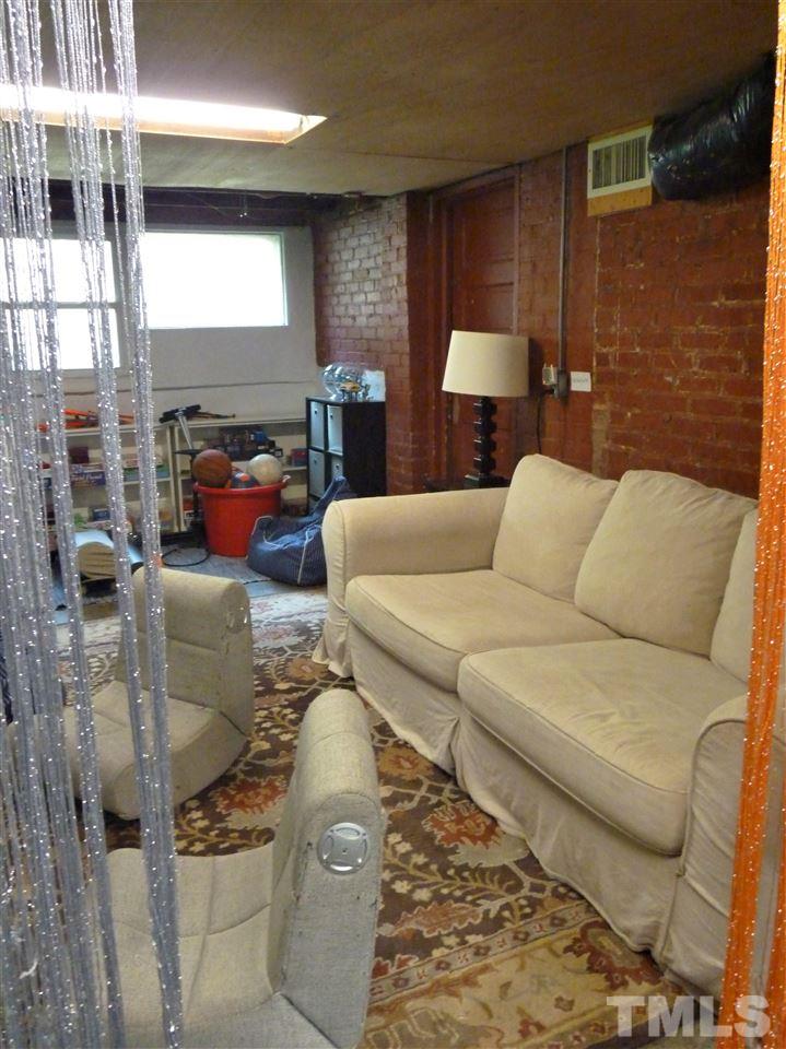 807 West South Street Raleigh, NC 27603 - Photo 23 of 30 The "Kid's Cave" in the heated and cooled walk-out basement. This space is not included in the living area square footage because ceiling is under 7'.