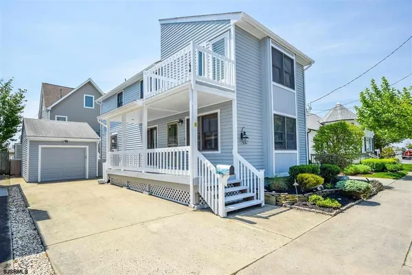 a view of house with outdoor space and porch