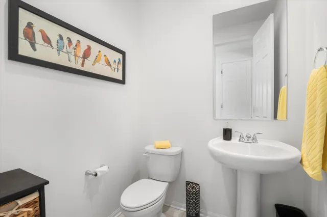a view of kitchen with cabinets table and chairs