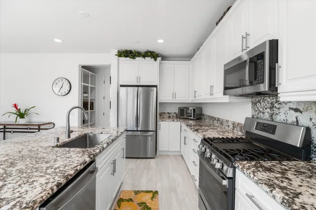 a bedroom with a bed and a closet