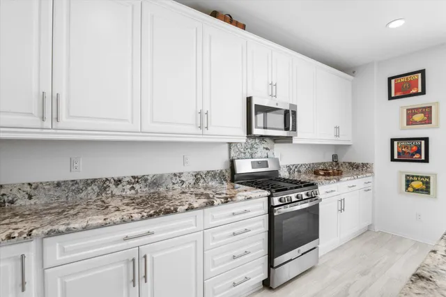 a bathroom with a double vanity sink mirror and double