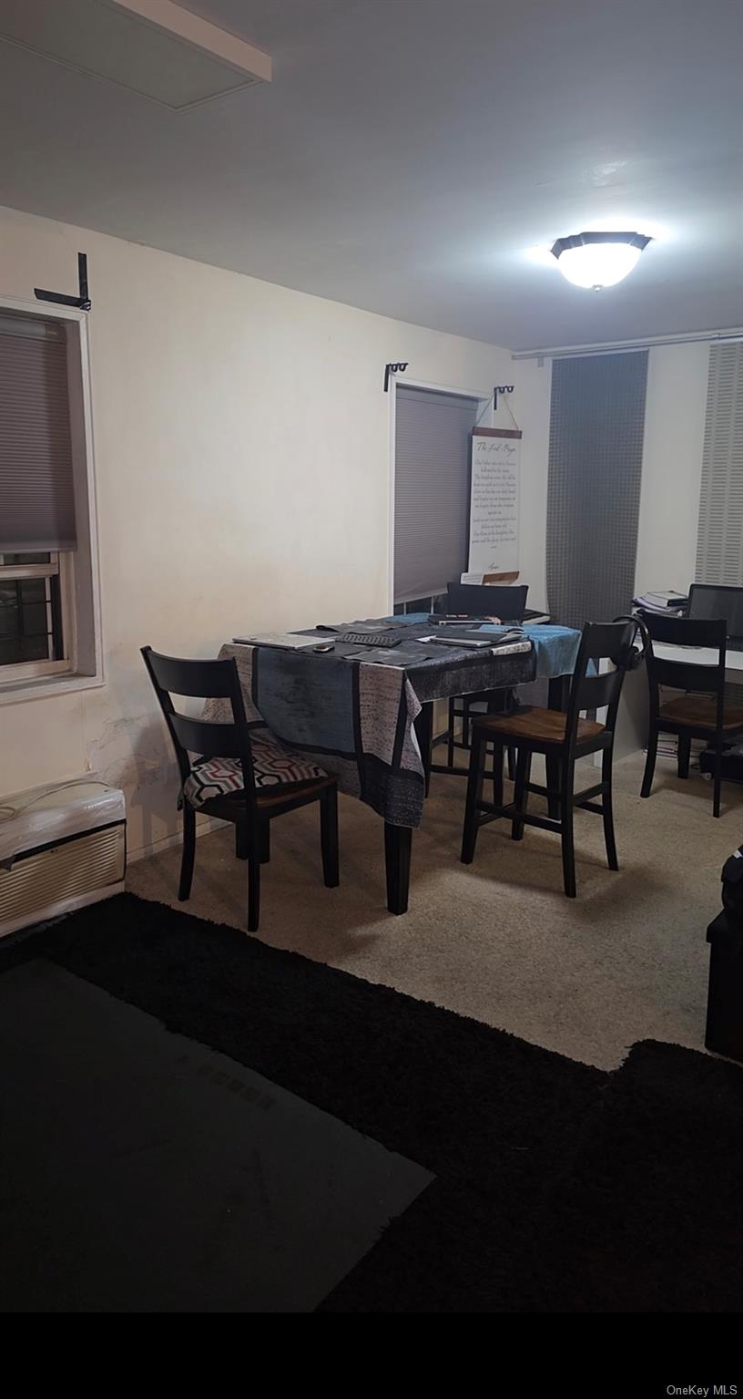 151-15 84th Street, Unit 6D Queens, NY 11414 - Photo 2 of 4 a view of a dining room with furniture