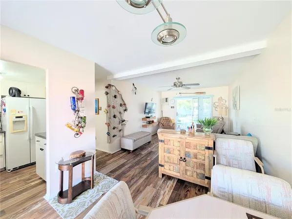 a room with furniture and a large window