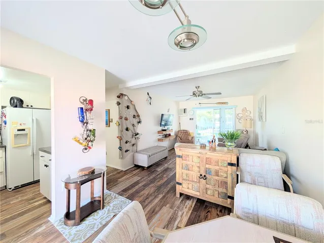 a room with furniture and a large window