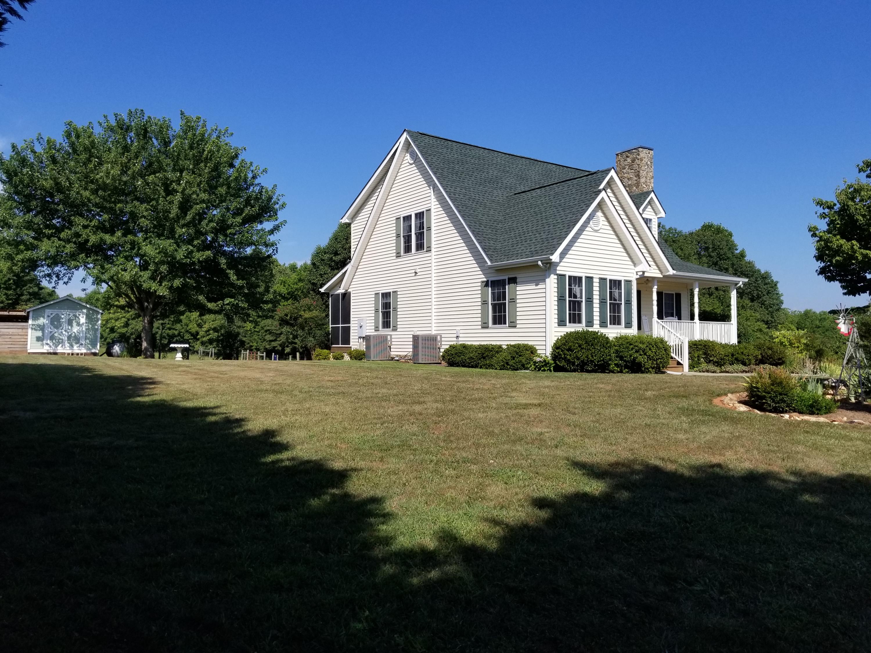 3218 Ayers Road Moneta, VA 24121 - Photo 2 of 67 a view of a house with a yard