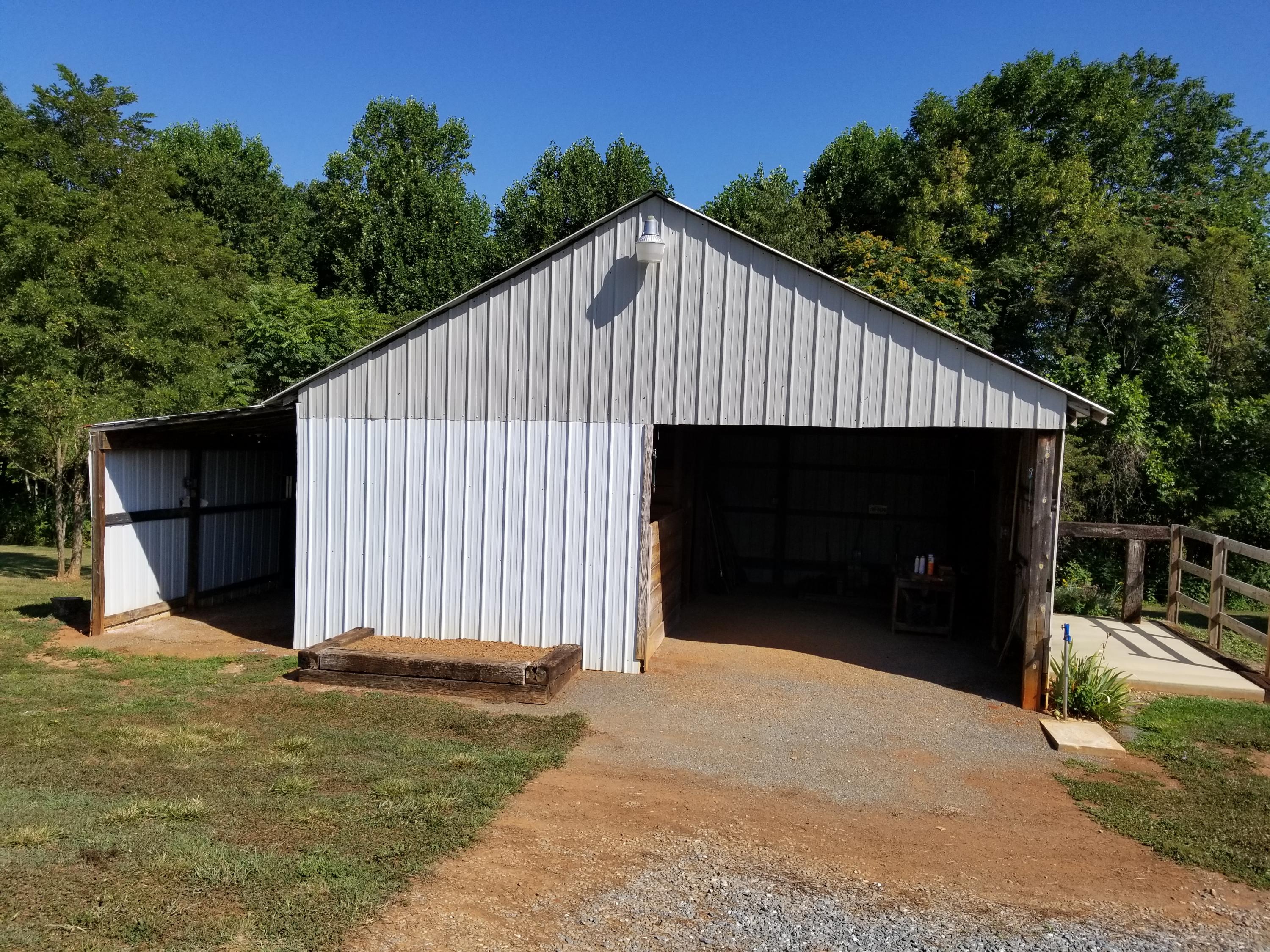3218 Ayers Road Moneta, VA 24121 - Photo 13 of 67 a view of a house with backyard and trees