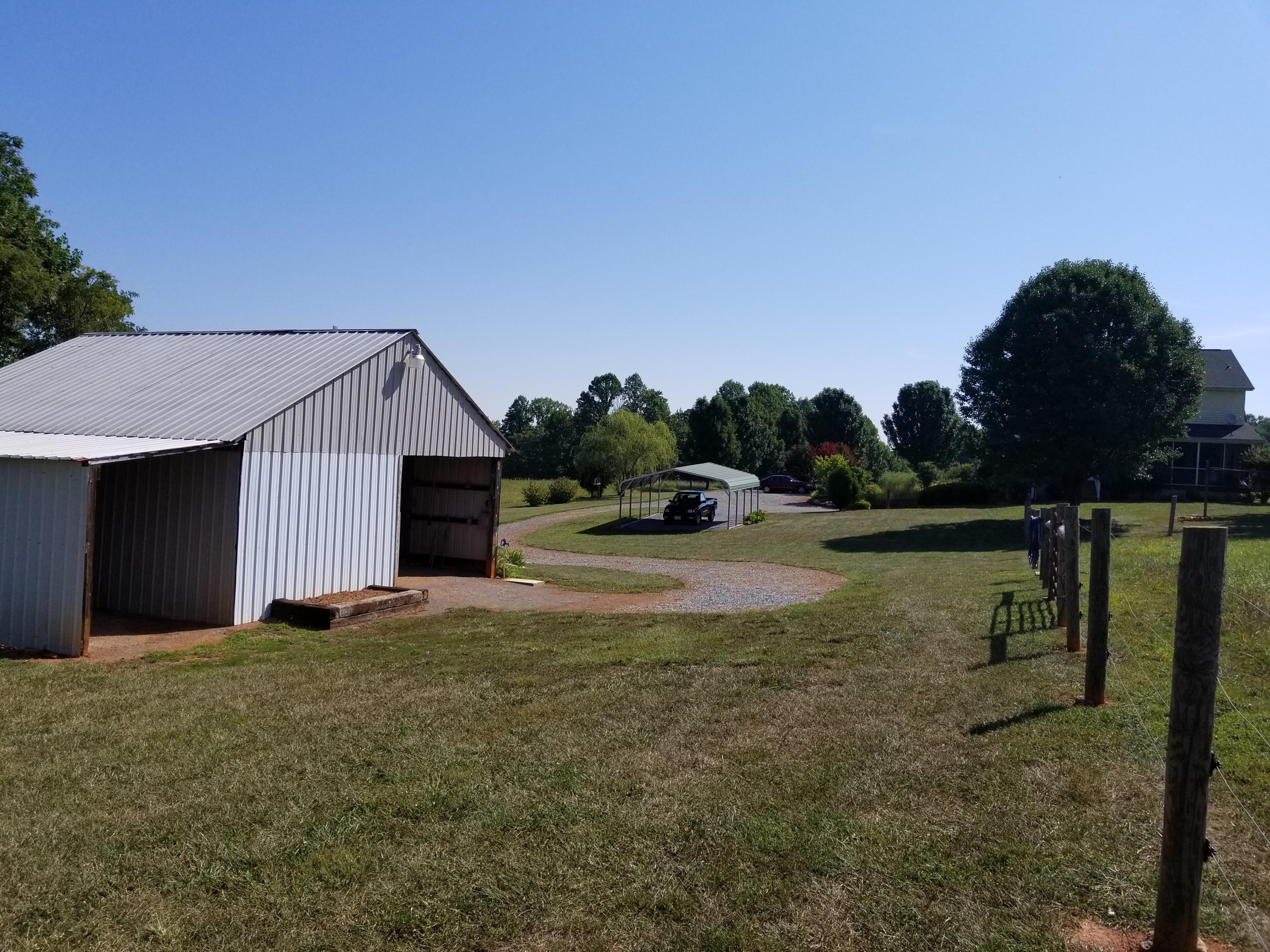 3218 Ayers Road Moneta, VA 24121 - Photo 15 of 67 a view of a house with backyard and trees