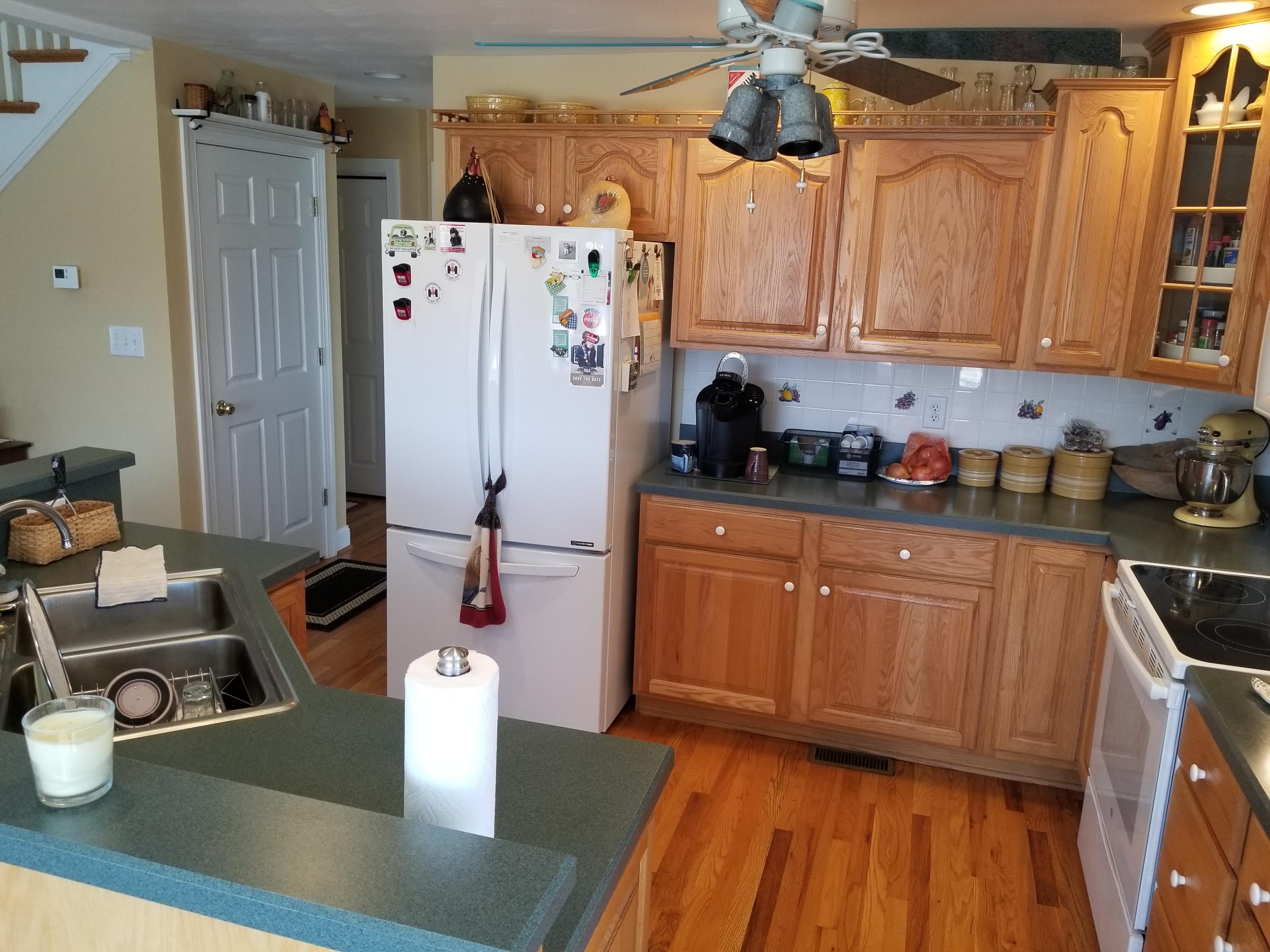 3218 Ayers Road Moneta, VA 24121 - Photo 22 of 67 a kitchen with stainless steel appliances granite countertop a refrigerator and a stove top oven