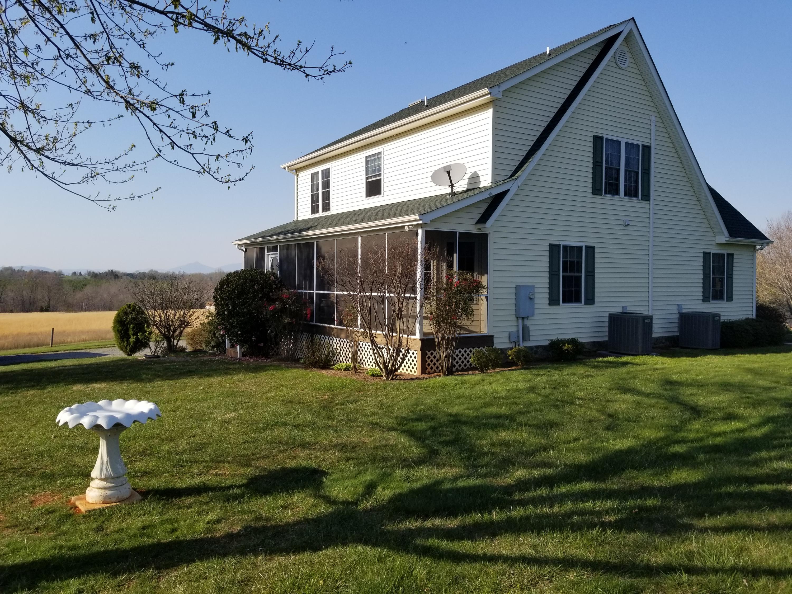 3218 Ayers Road Moneta, VA 24121 - Photo 8 of 67 a view of a house with backyard