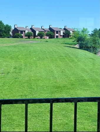 a view of outdoor space with deck and yard