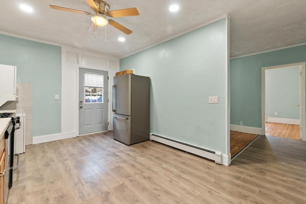 16 Mount Hood Terrace, Unit 2 Lynn, MA 01902 - Photo 19 of 28 wooden floor in an empty room with a window