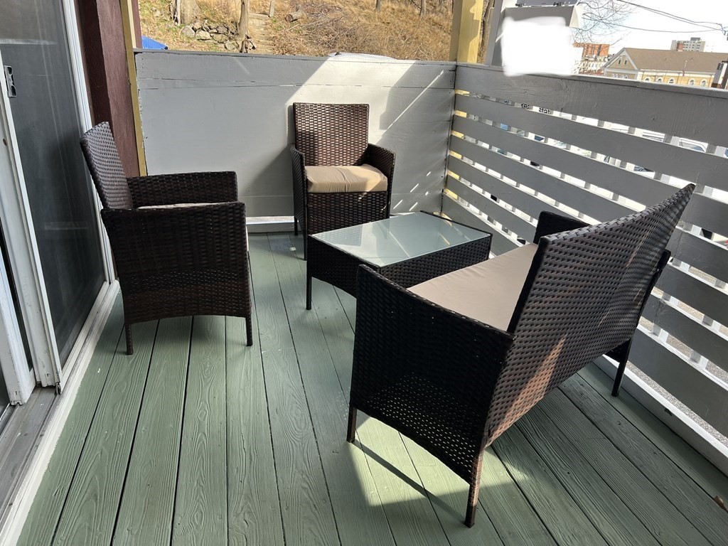 16 Mount Hood Terrace, Unit 2 Lynn, MA 01902 - Photo 27 of 28 a balcony with wooden floor