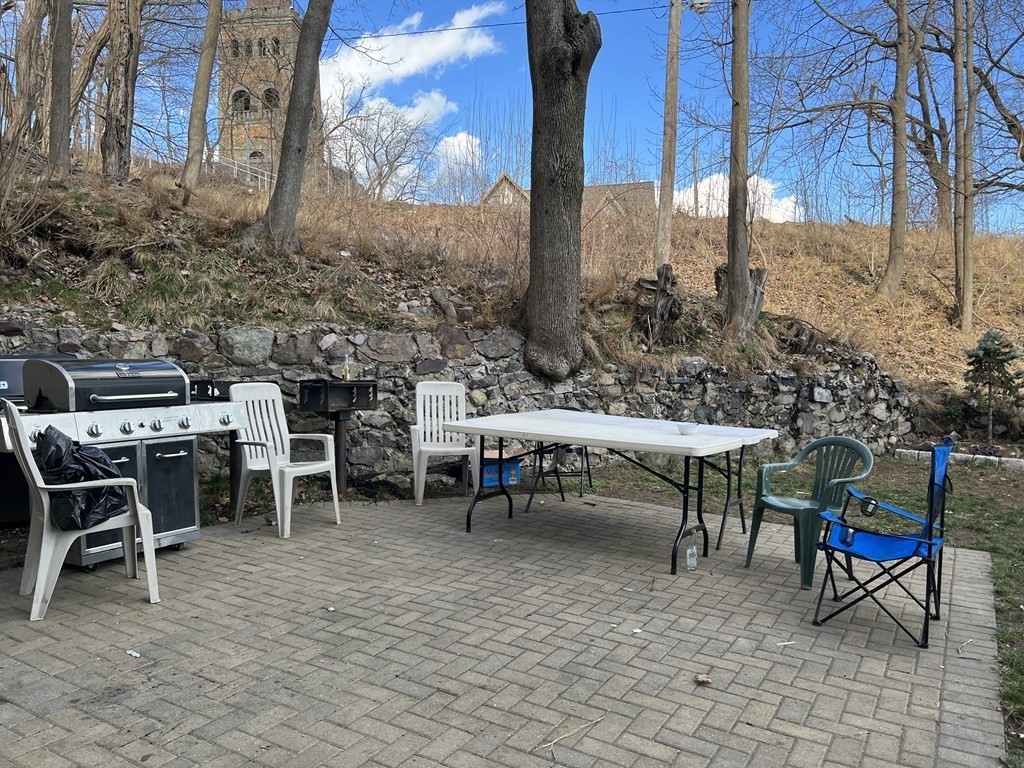 16 Mount Hood Terrace, Unit 2 Lynn, MA 01902 - Photo 28 of 28 a view of a tables and chairs in patio