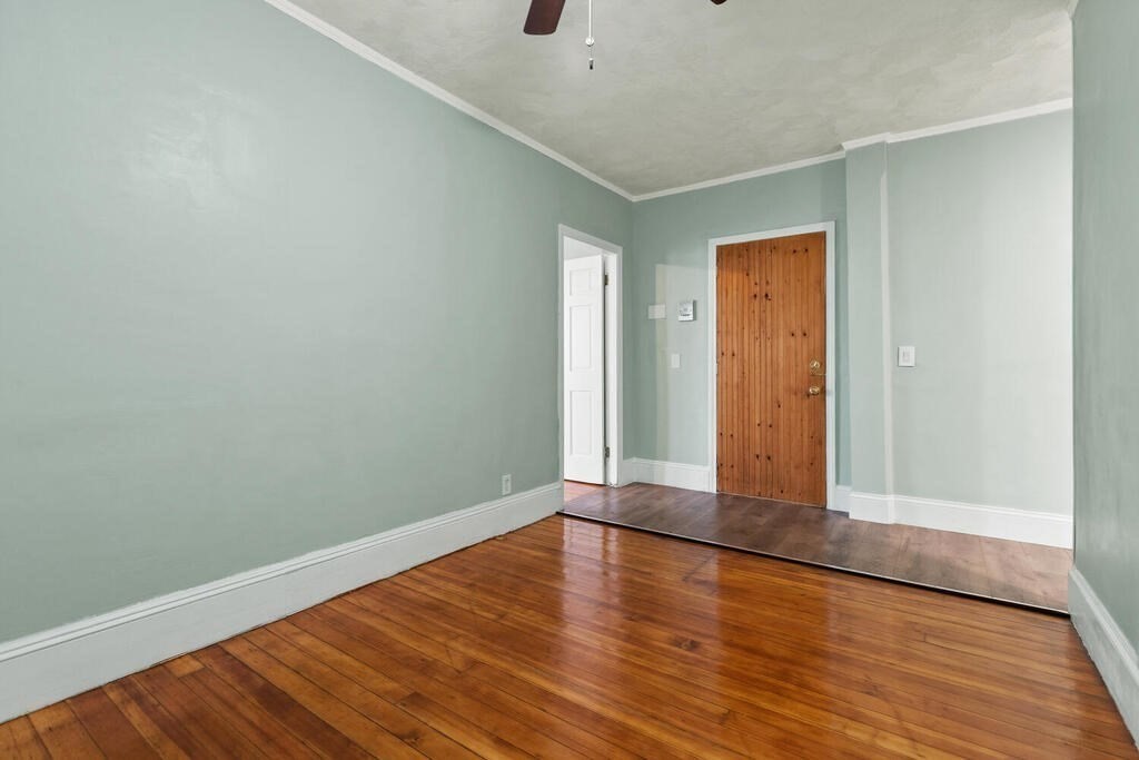 16 Mount Hood Terrace, Unit 2 Lynn, MA 01902 - Photo 10 of 28 a view of an empty room with wooden floor
