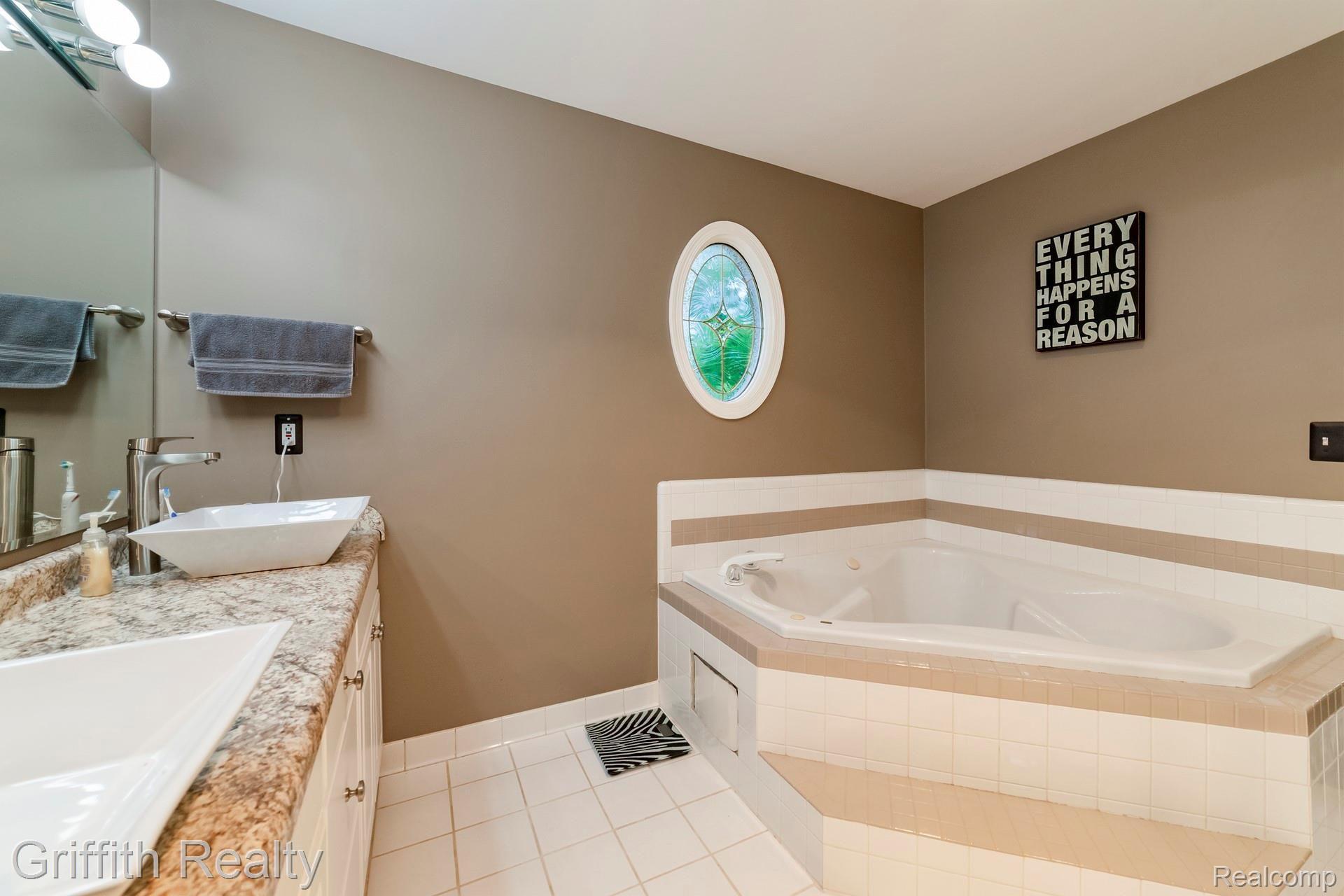 1899 Clover Ridge Drive Howell, MI 48843 - Photo 15 of 28 014-photo-master-bathroom-7163822.jpg