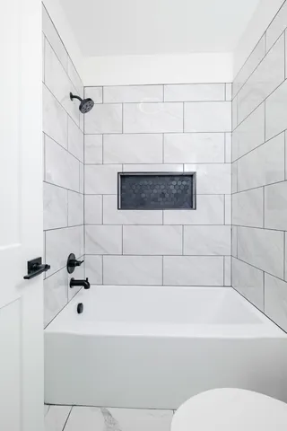 a front view of house with yard and outdoor seating