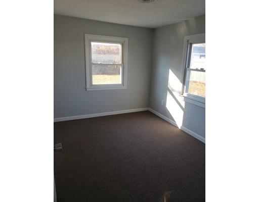 194 Nottingham Street Springfield, MA 01104 - Photo 11 of 13 a view of a room that has a window in it
