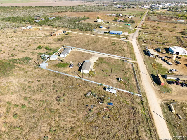 a view of swimming pool with outdoor seating