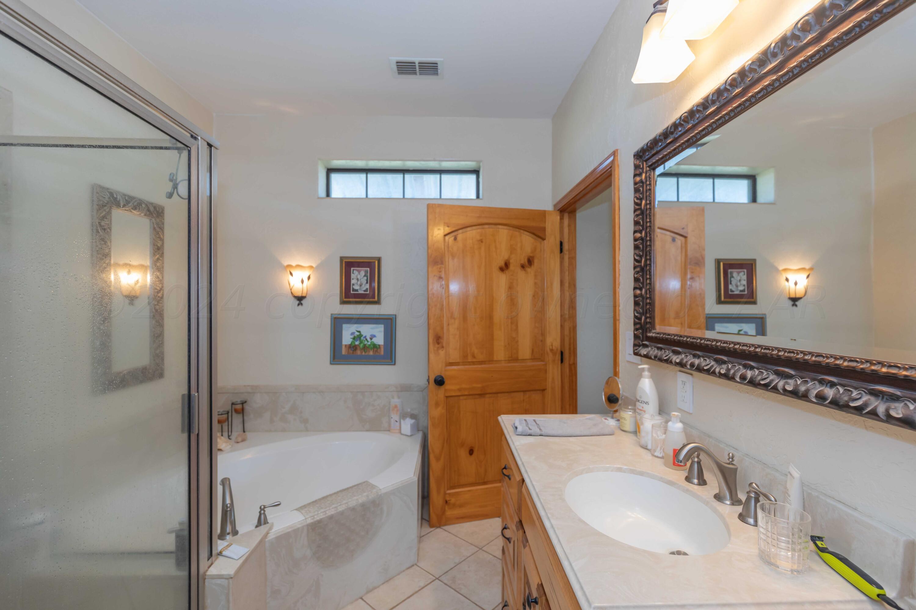 6700 West Dowlen Road Happy, TX 79042 - Photo 22 of 58 PRIMARY BATH VIEW 3