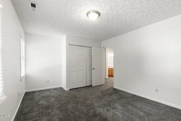 an empty room with an entryway